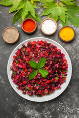 top view tasty vinaigrette beet salad with seasonings on dark background food health diet