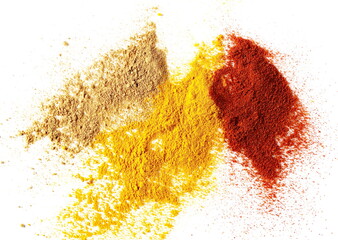 Ginger, red paprika, turmeric (Curcuma) powder pile mix isolated on white background, top view