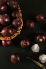 sweet red onions on background
