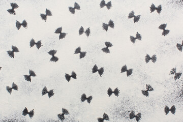 Many raw farfalle in studio