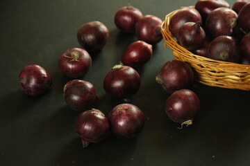 sweet red onions on background