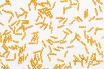 Many raw brown fusilli in jar in studio