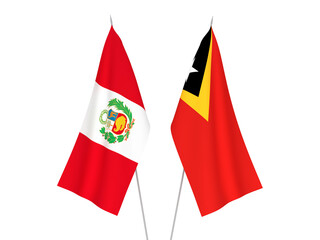 National fabric flags of Peru and East Timor isolated on white background. 3d rendering illustration.