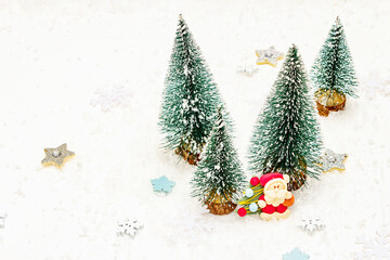 Small decorative Christmas trees with New Year's decor