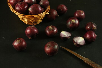 sweet red onions on background