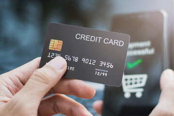 Man 's hand using mobile smart phone, online payment, Internet banking.