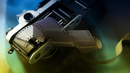 Old vintage film camera with film strip