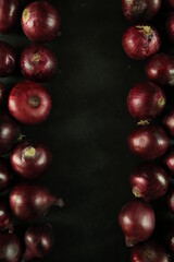 sweet red onions on background