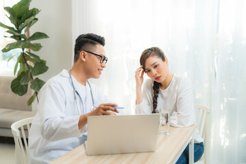 Doctor (obstetrician, gynecologist or psychiatrist) consulting and diagnostic examining woman...