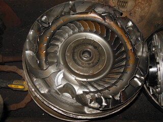 damaged and good internal parts of a torque converter for automotive equipment and automatic transmissions