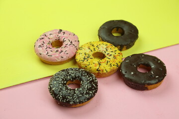 Fototapeta premium sweet donut with colored background