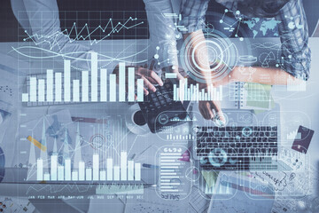 Double exposure of man and woman working together and financial graph hologram drawing. market analysis concept. Computer background. Top View.