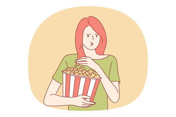 Fast and junk food, Unhealthy eating, calories concept. Young stressed girl cartoon character eating pop corn from basket with hands. Overweight, snack, lifestyle, harmful eating