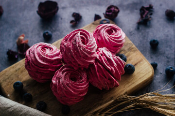 Delicious berry marshmallow. Handmade marshmallow with black currant. Marshmallow with berries on the table