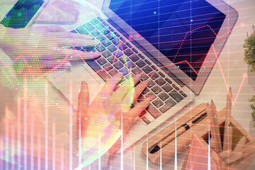Obraz premium Multi exposure of woman hands typing on computer and forex chart hologram drawing. Stock market analysis concept.