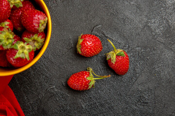 top view fresh red strawberries inside little basket on dark floor fruit tree berry