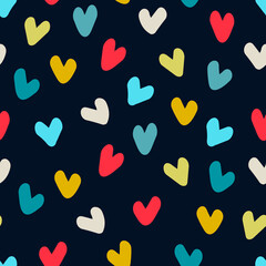 Fototapeta na wymiar Seamless pattern. Hand drawn multicolored heart shapes on dark blue background, for wrapping paper and other design projects. Valentines Day concept, love, romance concept