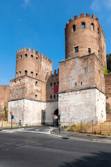 Fototapeta na wymiar Porta San Sebastiano, the largest of the gates in the defensive walls of the Aurelian Walls, from here passed the Via Appia, the regina viarum. Regina Viarum Italy