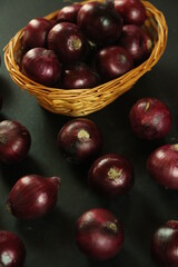 sweet red onions on background