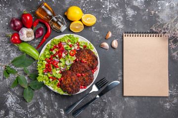 top view delicious meat cutlets with fresh salad on the grey background meal dish photo food
