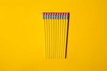 yellow pencils on yellow background