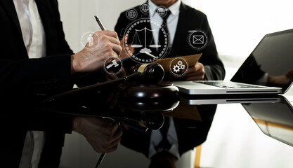 Concepts of Law and Legal services. Lawyer working on digital interface icons.