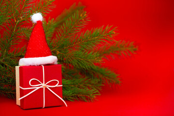 New Year's 2022 gift on a red background. Christmas background congratulation. 