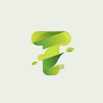 T letter eco logo with green diagonal stripes, leaves and waves.