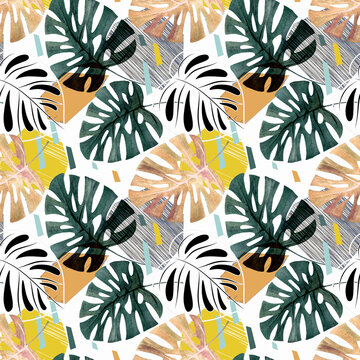 Seamless tropical pattern. Green leaves of a palm tree with bright decorative elements on a white background.