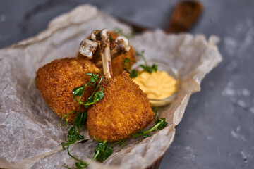 Chicken drumstick, breaded and deep-fried