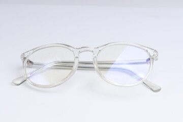 Fototapeta premium transparent clear glasses on isolated white background. fashion and eye health products