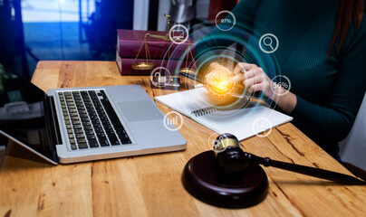 Concepts of Law and Legal services.	lawyer hands using law interface icons.