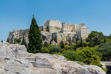 Fototapeta na wymiar Ruins of Acropolis with Parthenon, Erechtheum, Beule Gate and Temple of Athena in the city center, view from Areopagus - Hill