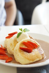 Fluffy pancake with Chocolate nuts sauce.