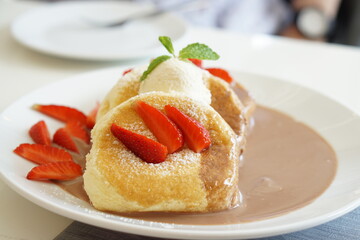 Fluffy pancake with Chocolate nuts sauce.