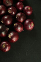 sweet red onions on background