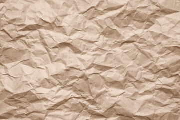 Obraz premium Crumpled kraft paper. Texture of the old surface. Eco-friendly packaging.