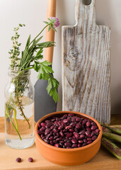 Beans in a clay bowl, concept food background with natural ingredients