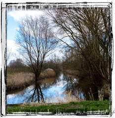 slowly the river flows through the landscape