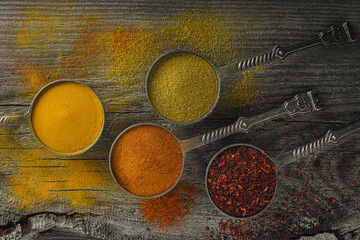 Wooden table of colorful spices. Food, indian, colorful, top view frame style