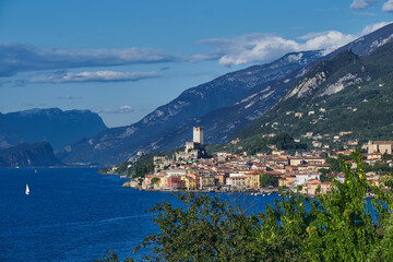 Fototapeta premium Palazzo dei Capitani is a historic building in Italy. Scaliger Castle in Malcesine Lake Garda Italy. Panoramic view of the old town of Malcesine. Italian resort on Lake Garda.