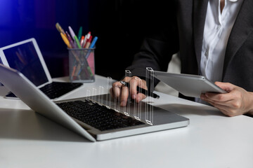 Hands of business people working with documents and digital network and stock exchange market with with graphs analysis candle interface icons on table office. 