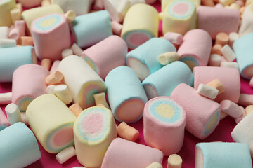 Sweet marshmallow on pink background, close up
