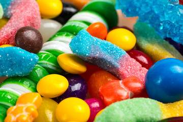 Macro Photography. Many different yummy candies and jellies as background, top view