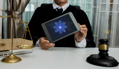 Concepts of Law and Legal services.	lawyer working with digital technology interface icons.