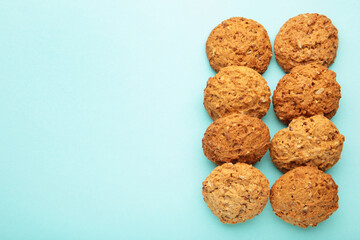 Many oats biscuits on a blue background