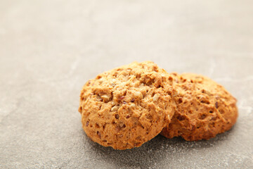 Oats biscuits on a grey background with copy space