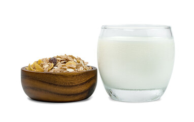 milk in transparent glass and muesli multi fruit in wooden bowl isolated on white background ,include clipping path