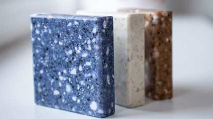 Decorative artificial stone in samples. Suitcase with samples of artificial stone. Finishing material, interior renovation.