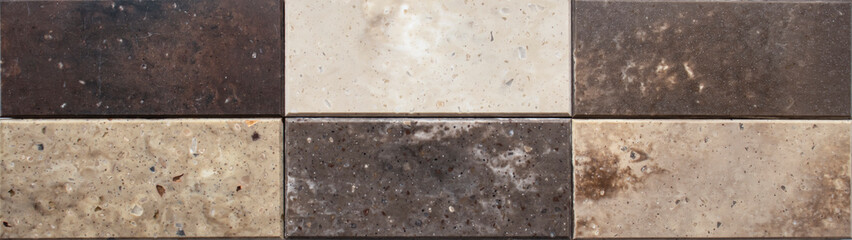 Decorative artificial stone in samples. Suitcase with samples of artificial stone. Finishing material, interior renovation.
